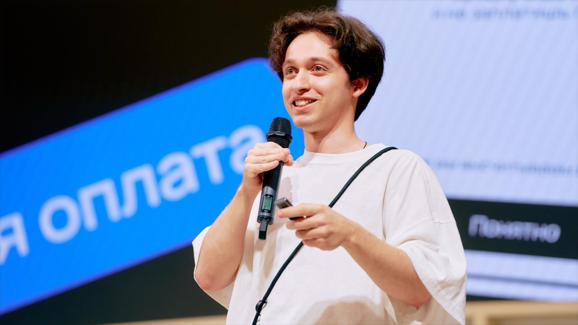 Photo of me presenting my project on a conference
